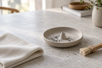 Cooled incense holder with soft brush and cloth ready for finish-safe cleaning