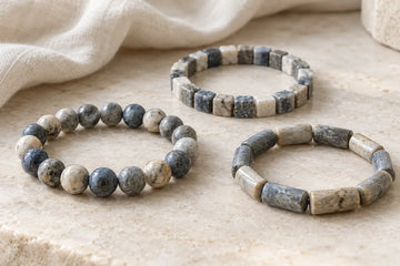 Editorial concept comparing round, square-cut, and cylindrical stone bracelet bead shapes