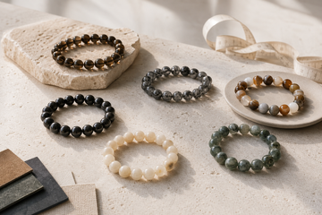 Natural stone bracelets arranged with a measuring tape for a bracelet buying guide