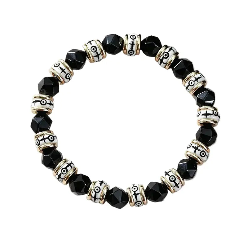 The Obsidian Guardian - Tibetan Black Onyx & Carved Bone Bracelet ZANYÉ