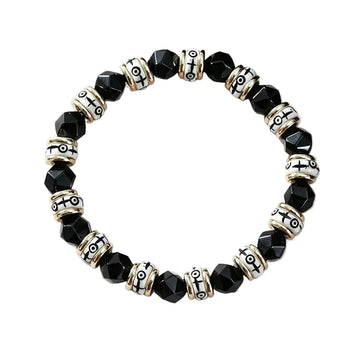 The Obsidian Guardian - Tibetan Black Onyx & Carved Bone Bracelet ZANYÉ