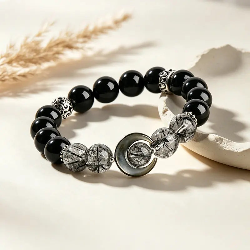 The Lunar Shield - Obsidian & Rutilated Quartz Bracelet ZANYÉ