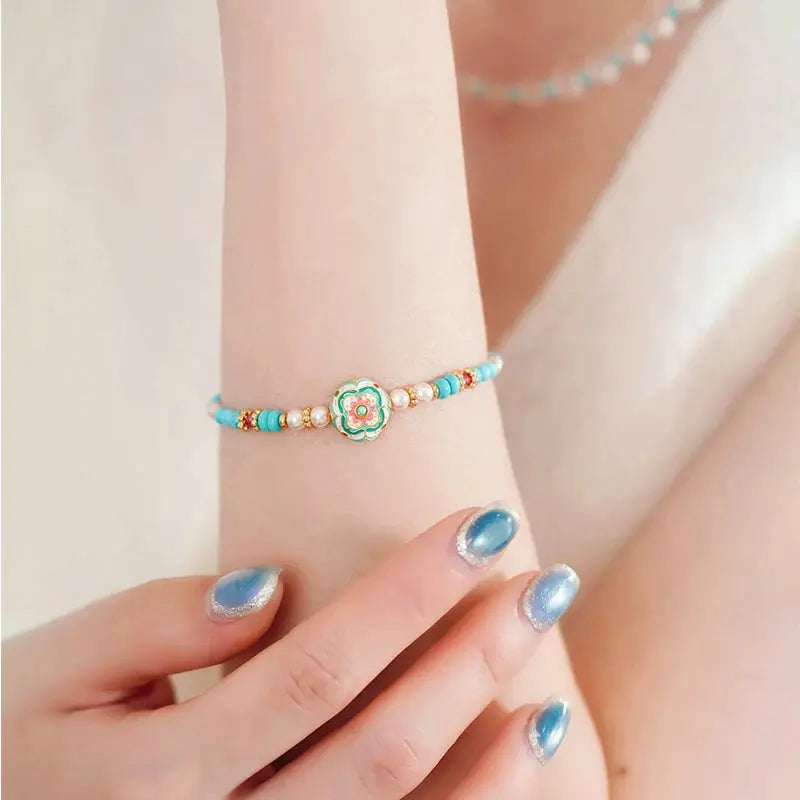 The Auspicious Baoxiang Flower Enamel Bracelet ZANYÉ