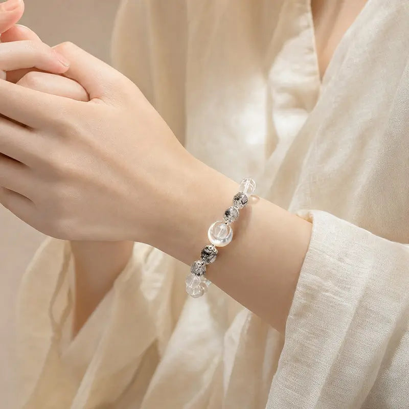 The Lunar Shield - Obsidian & Rutilated Quartz Bracelet ZANYÉ