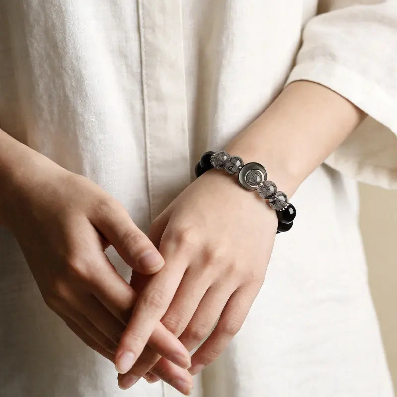 The Lunar Shield - Obsidian & Rutilated Quartz Bracelet ZANYÉ