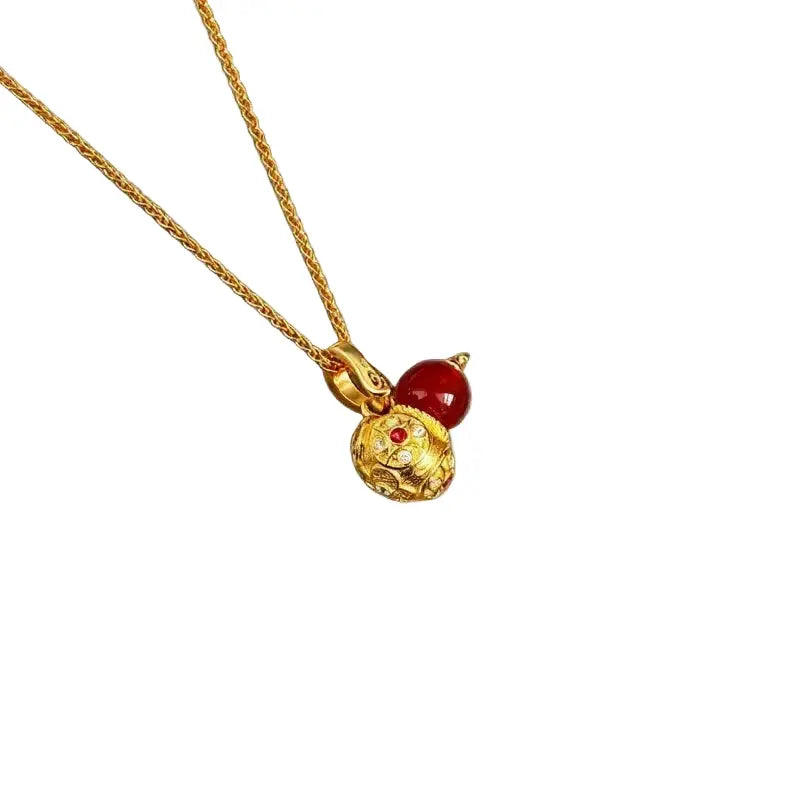The Gilded Hulu Talisman Necklace ZANYÉ
